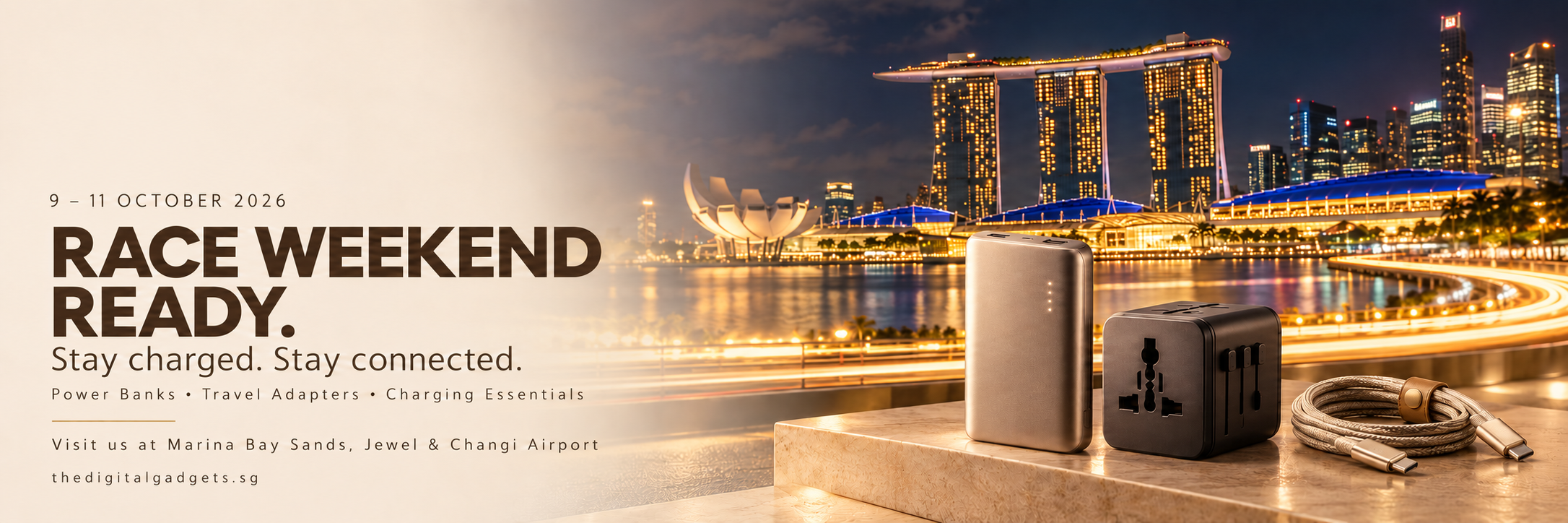 The Digital Gadgets. Race Weekend Ready, 9–11 October 2026. Stay charged. Stay connected. Power banks, travel adapters and charging essentials, with Singapore's Marina Bay skyline at night.